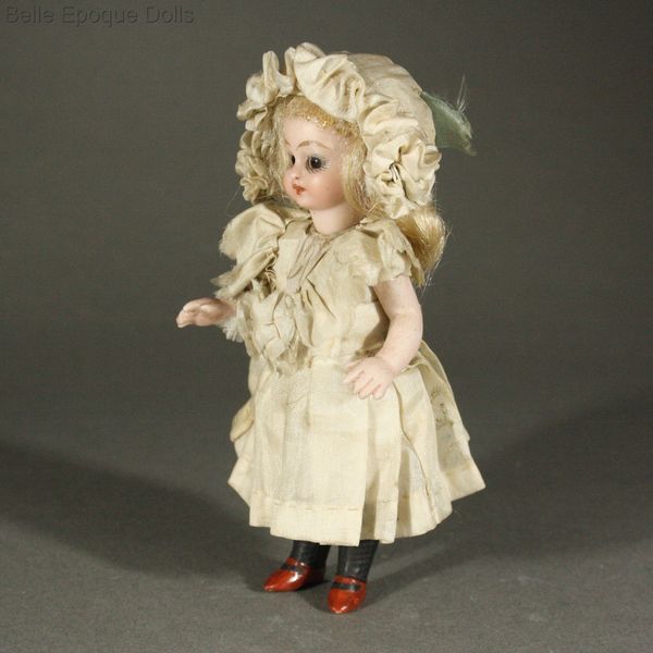 black-stockinged miniature doll , Antique german solid domed mignonette , Puppenstuben puppen mignonnette ganzbiskuit