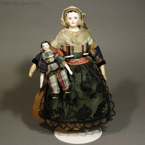 Two Early All-Original Porcelain Dollhouse Dolls - The Mother and her Son