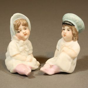 Antique Two German All-Bisque Children Seated Brother and Sister