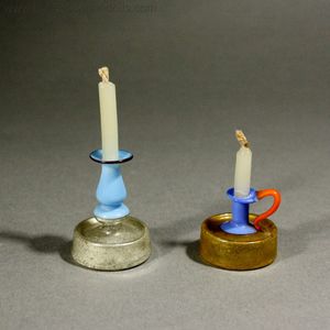 Two Candle holders in Silver and Gold Mercury Glass