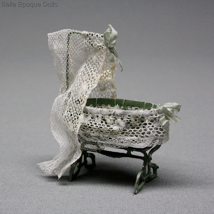 Antique Dollhouse miniature cradle , Frozen Charlotte