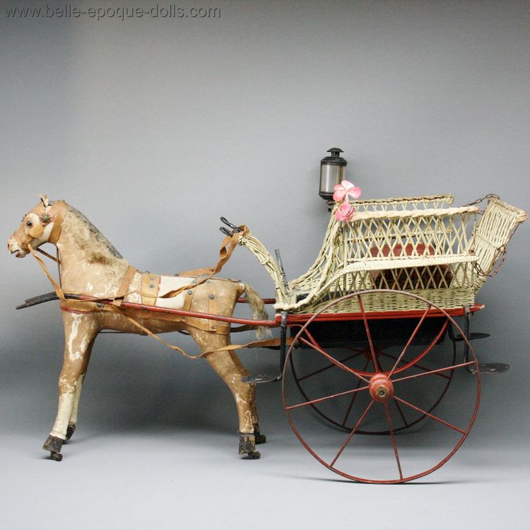 Horse-drawn Buggy antique toy , antique two whelled cart with horse , miniature