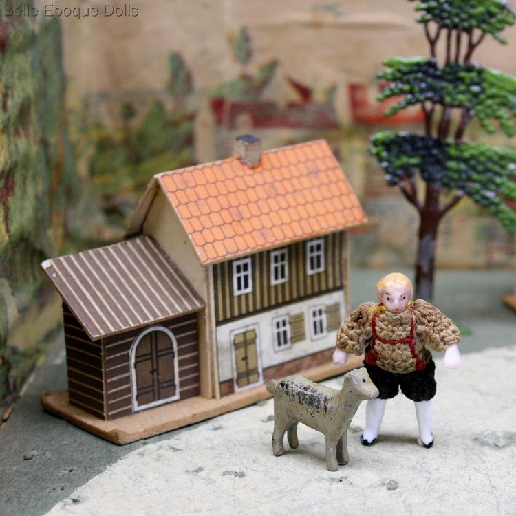 antique miniature wooden animals , farms and pastures antique cardboard box , antique miniature wooden animals