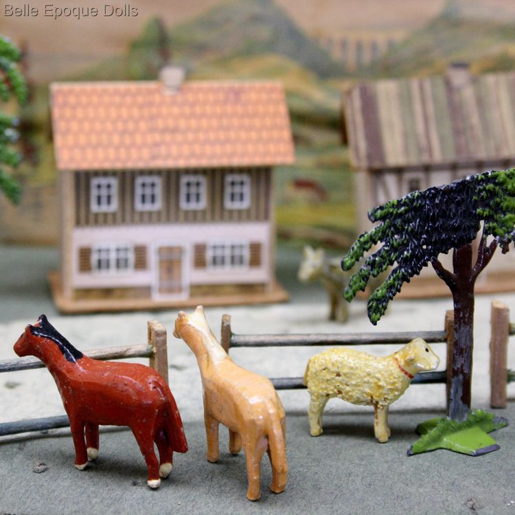 farms and pastures antique cardboard box , antique miniature wooden animals