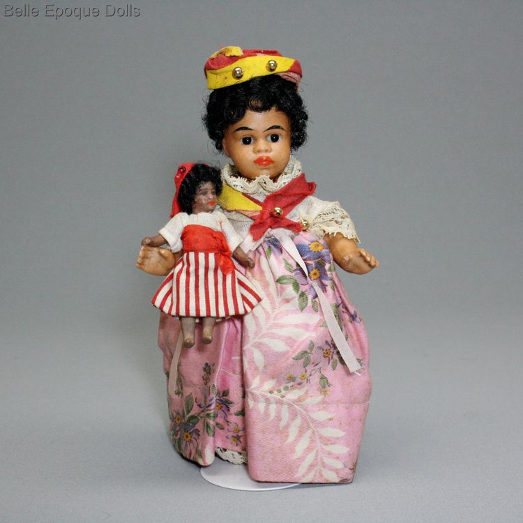 light brown complexioned all bisque doll , antique mulatto Gebruder Kuhnlenz doll