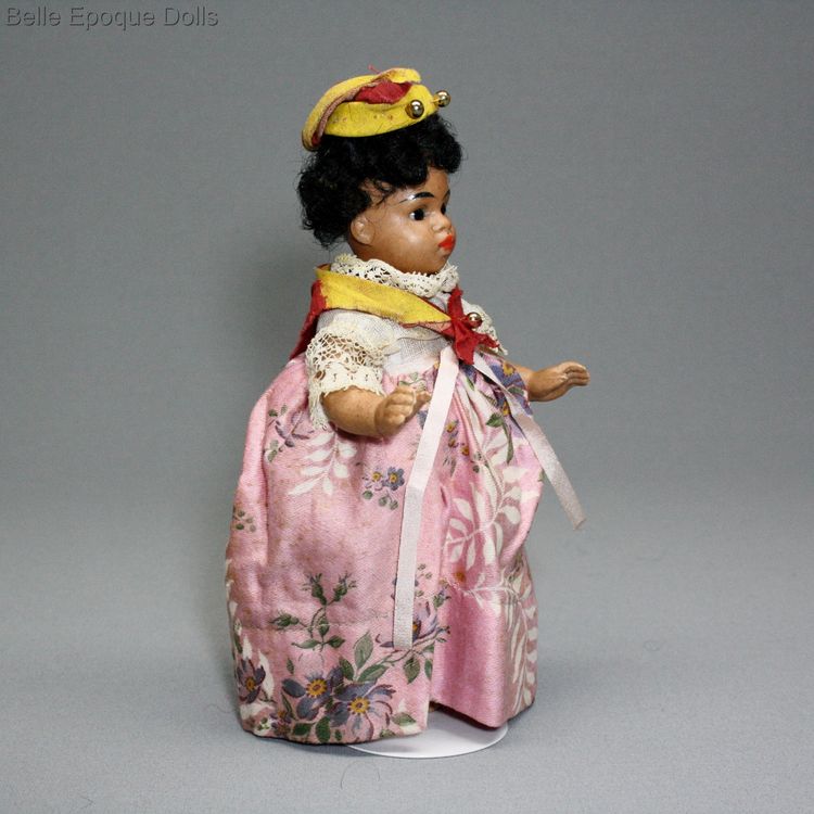 antique mulatto Gebruder Kuhnlenz doll , Antique Dollhouse miniature , light brown complexioned all bisque doll