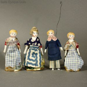 Four Early Theater Dolls in Original Costumes
