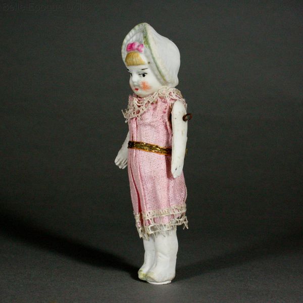 Antique all bisque bonnet doll , Puppenstuben puppen