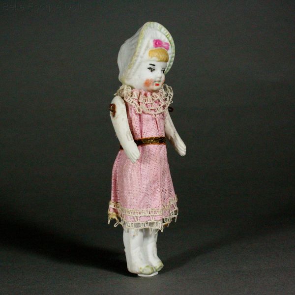 Antique all bisque bonnet doll , Puppenstuben puppen