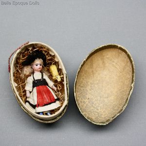 Antique french all bisque tiny mignonette , antique Shepherdess  in Presentation Easter Egg , Antique french all bisque tiny mignonette 