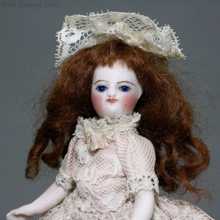 antique all bisque mignonette , french all bisque doll