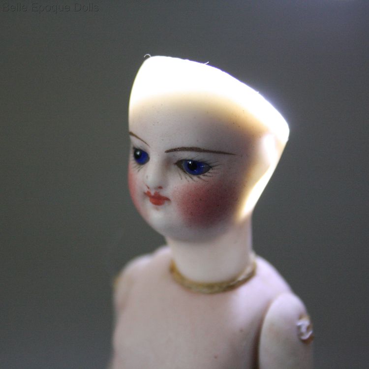 antique all bisque mignonette , french all bisque doll