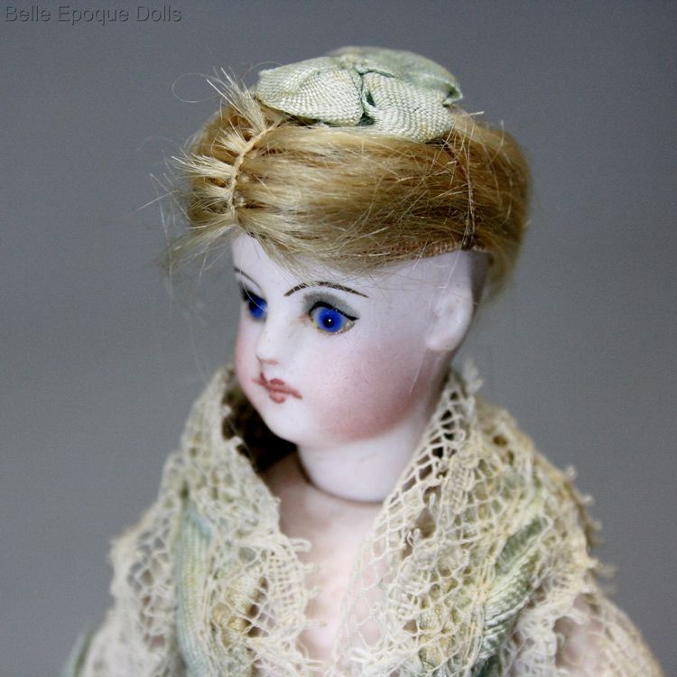 French bisque mignonette with jointed elbows , antique French miniature doll mignonette , antique all bisque doll sustrac